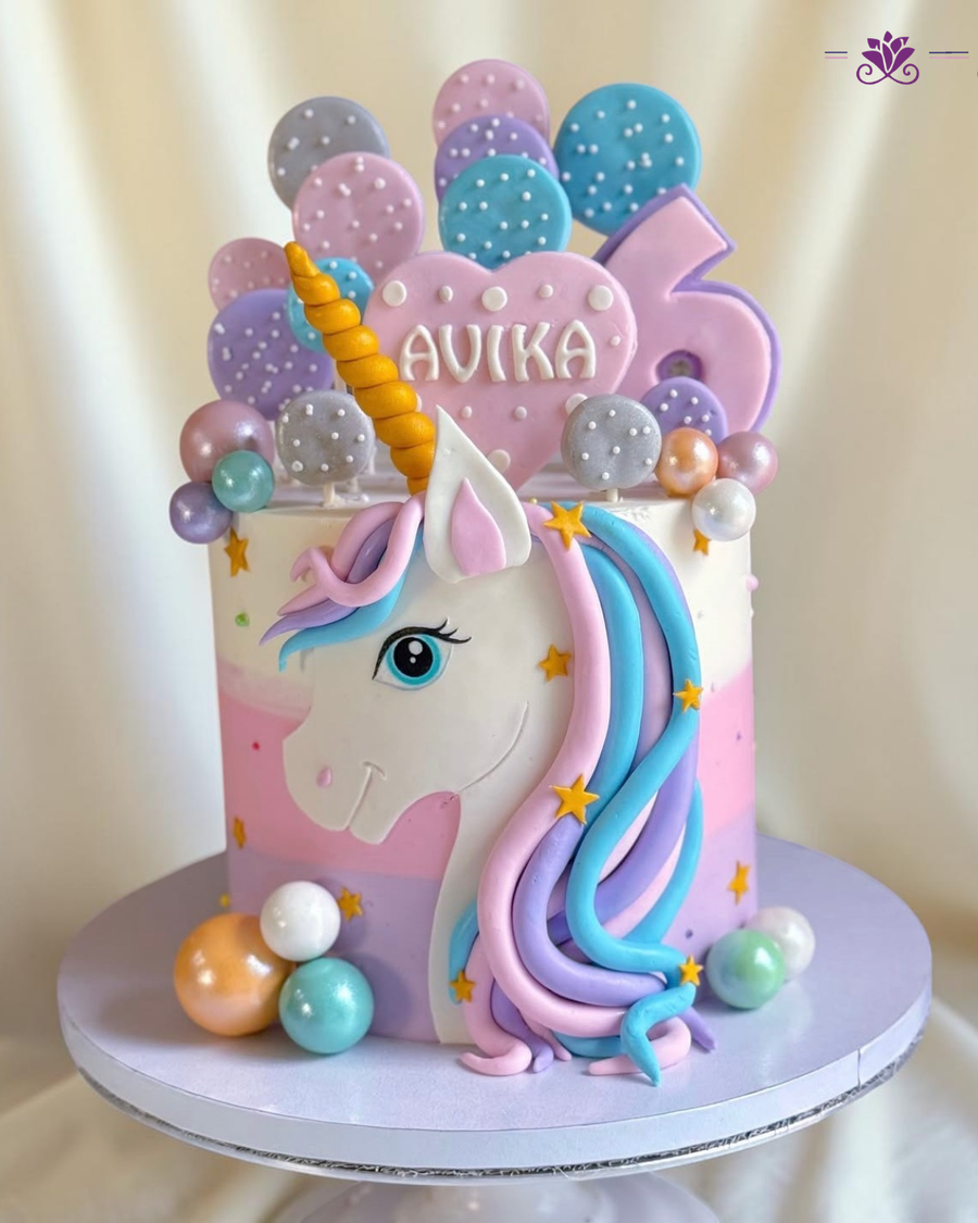 pastel unicorn birthday cake
