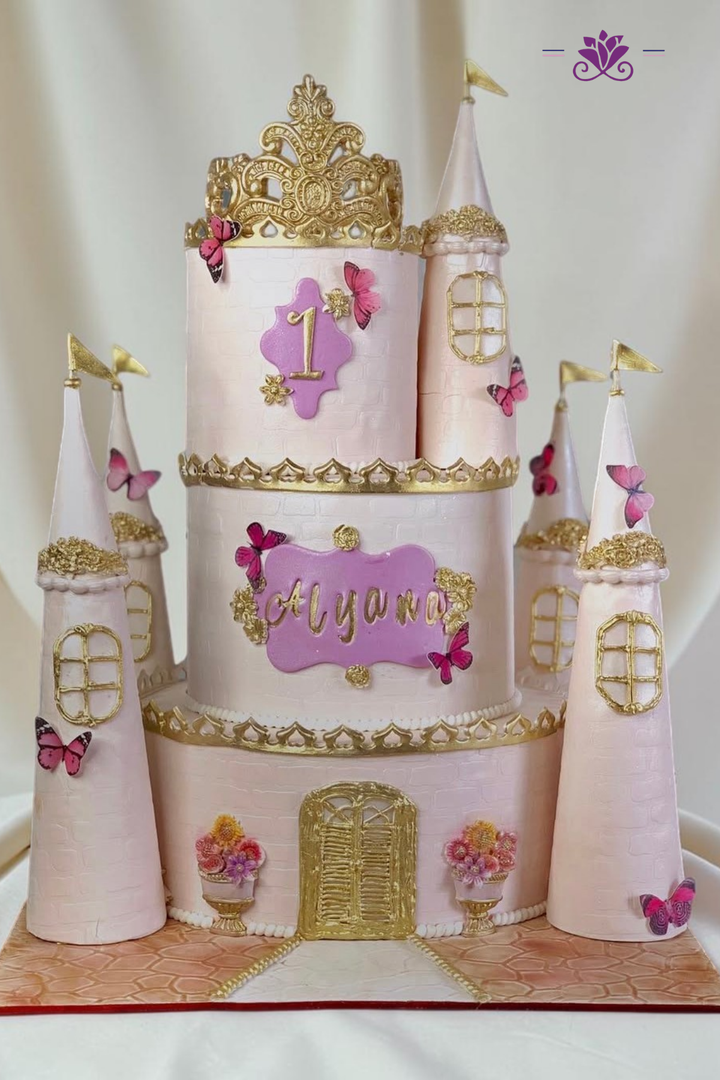 Magical pink and gold princess castle cake