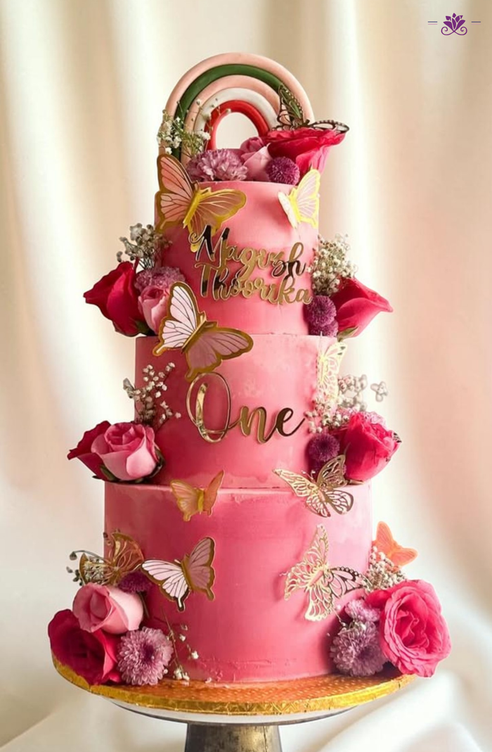 1st Birthday Butterfly Floral Cake with Pink Theme & Rainbow Topper