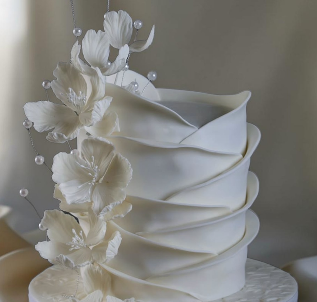 Elegant White Draped Floral Designer Cake