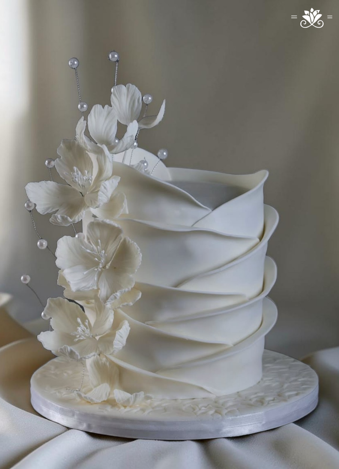 Elegant White Draped Floral Designer Cake