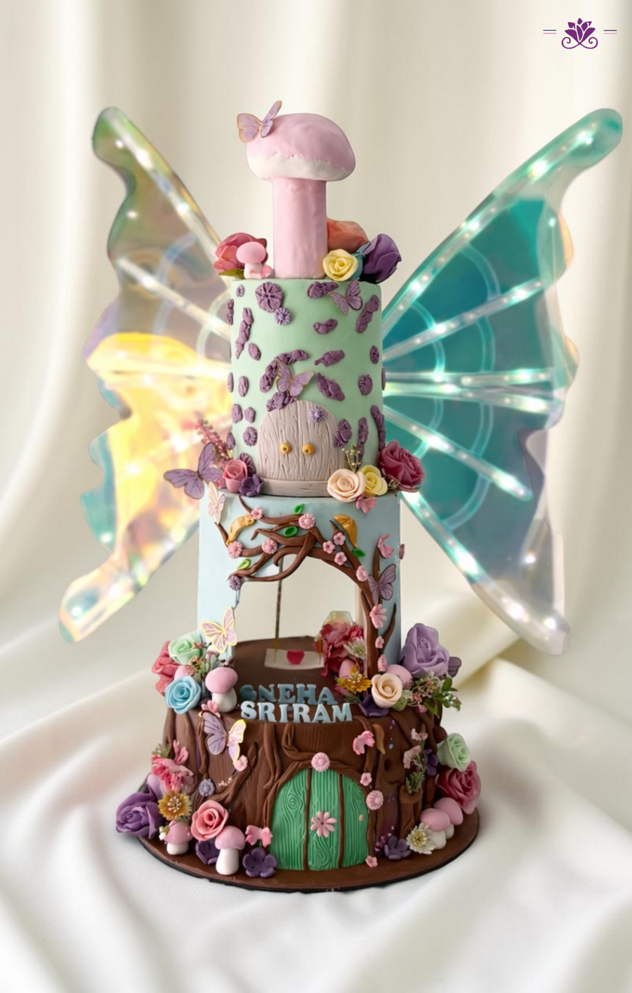 Fairy Garden Theme Cake with LED Wings, Treehouse Design & Floral Fantasy Decor (Eggless Designer Cake)
