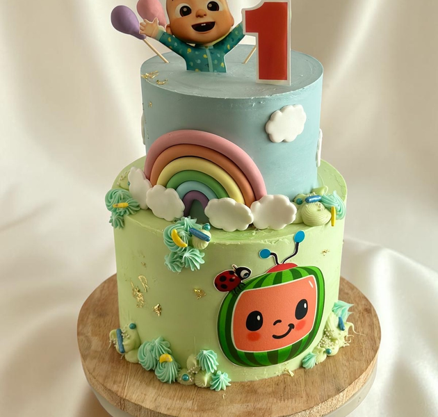 Pastel Cocomelon Rainbow First Birthday Cake