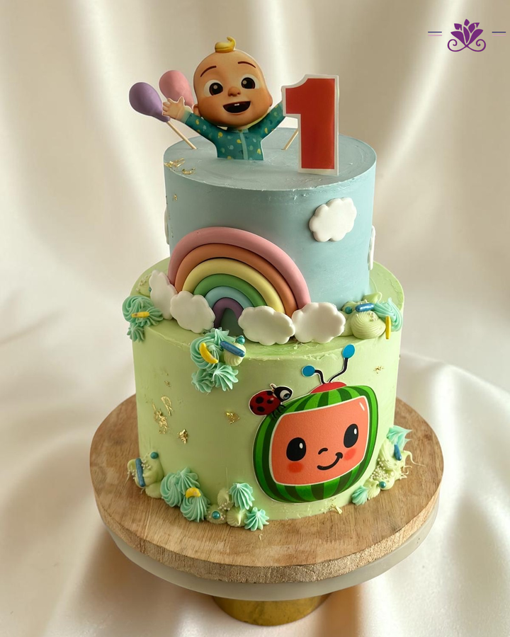 Pastel Cocomelon Rainbow First Birthday Cake