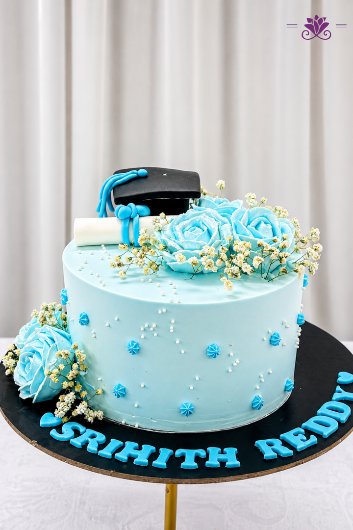 Graduation Cap & Floral Pastel Blue Celebration Cake