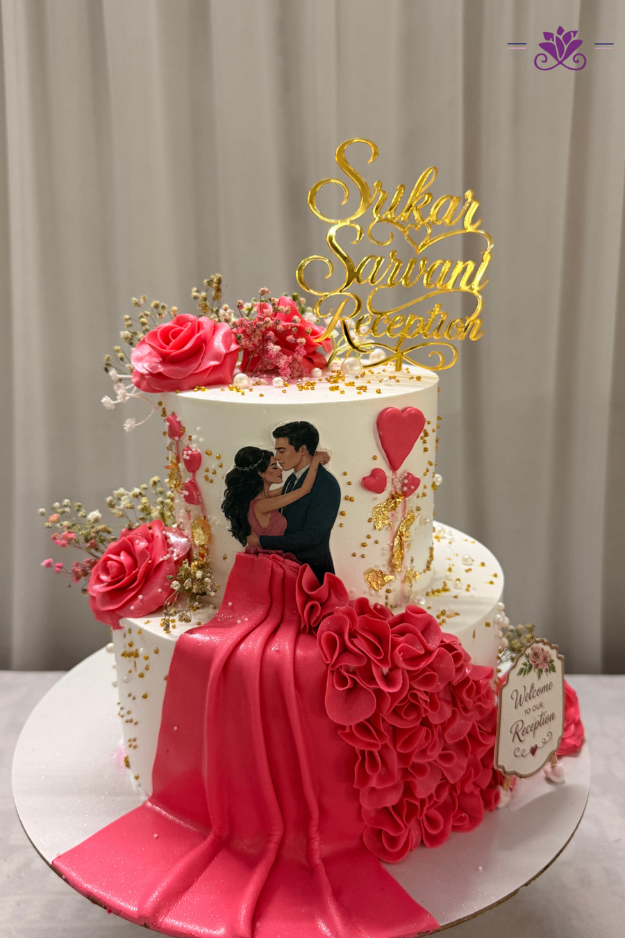 Stunning red and gold wedding reception cake