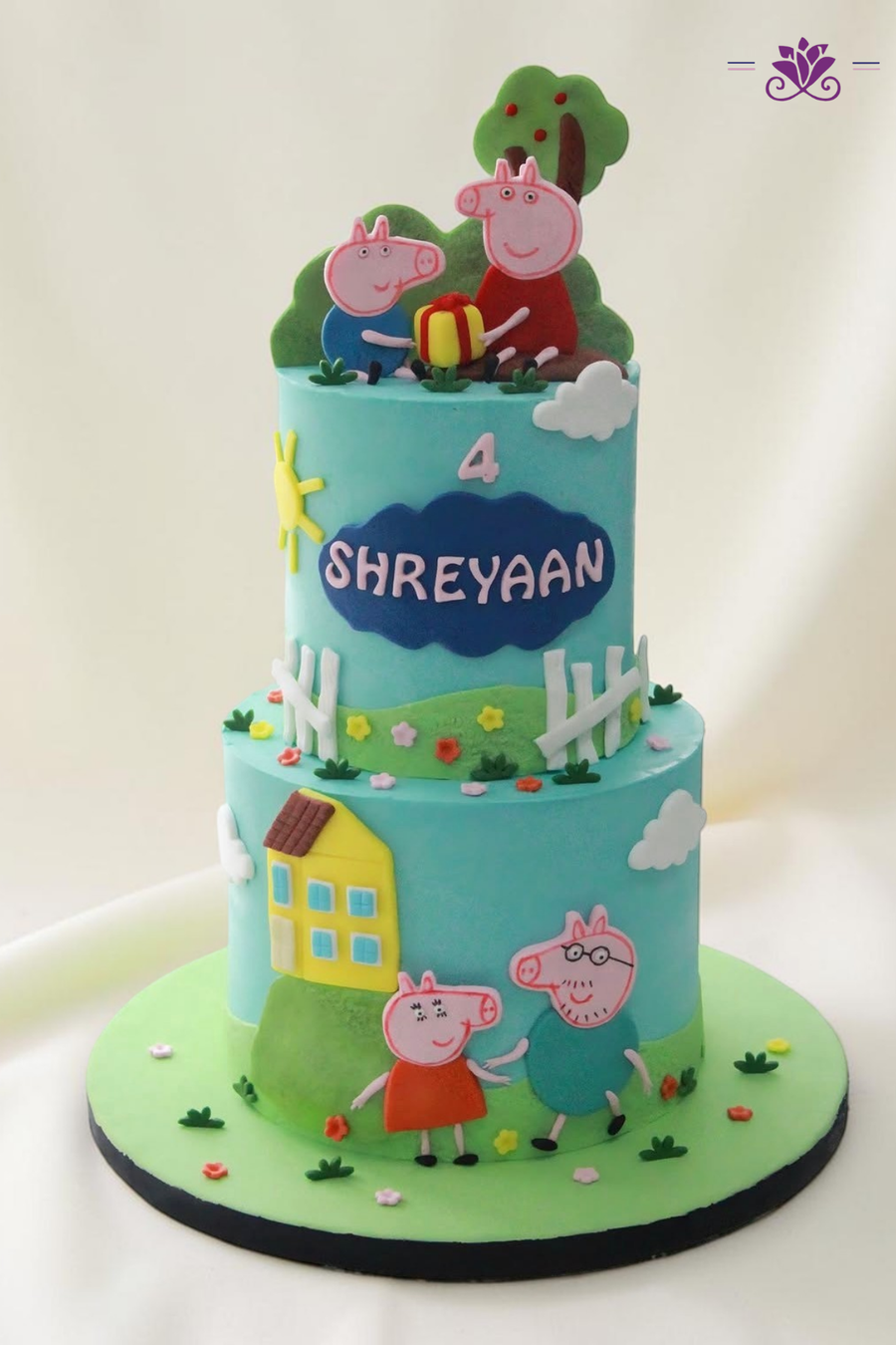 Peppa Pig and her family themed 4th birthday cake