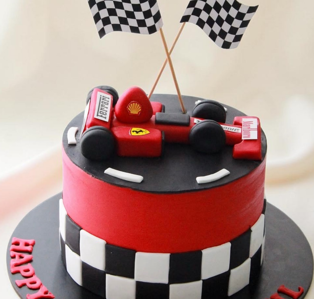 stylish red and black racing car-themed birthday cake