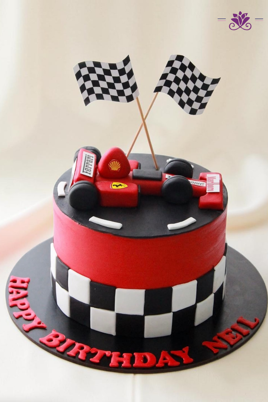 stylish red and black racing car-themed birthday cake