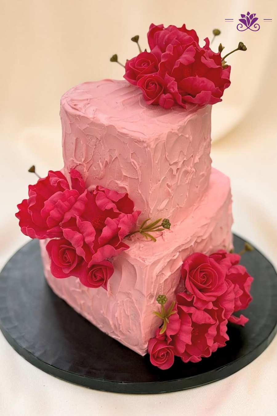Beautiful pink heart-shaped birthday cake