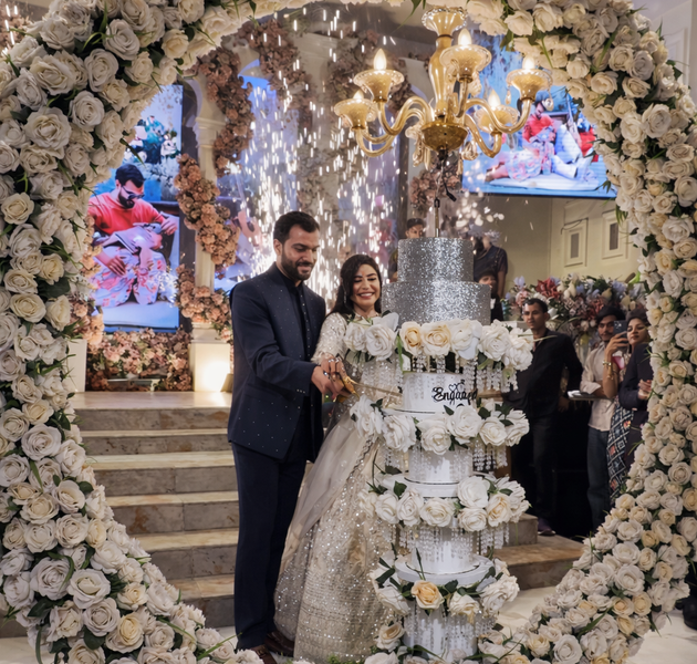 Luxury Italian Chandelier Wedding Cake with Floral Arch Setup