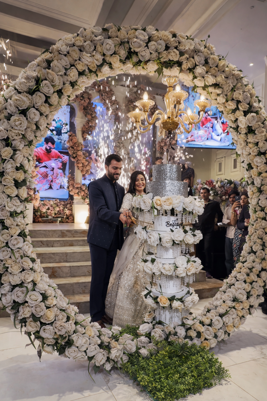Luxury Italian Chandelier Wedding Cake with Floral Arch Setup