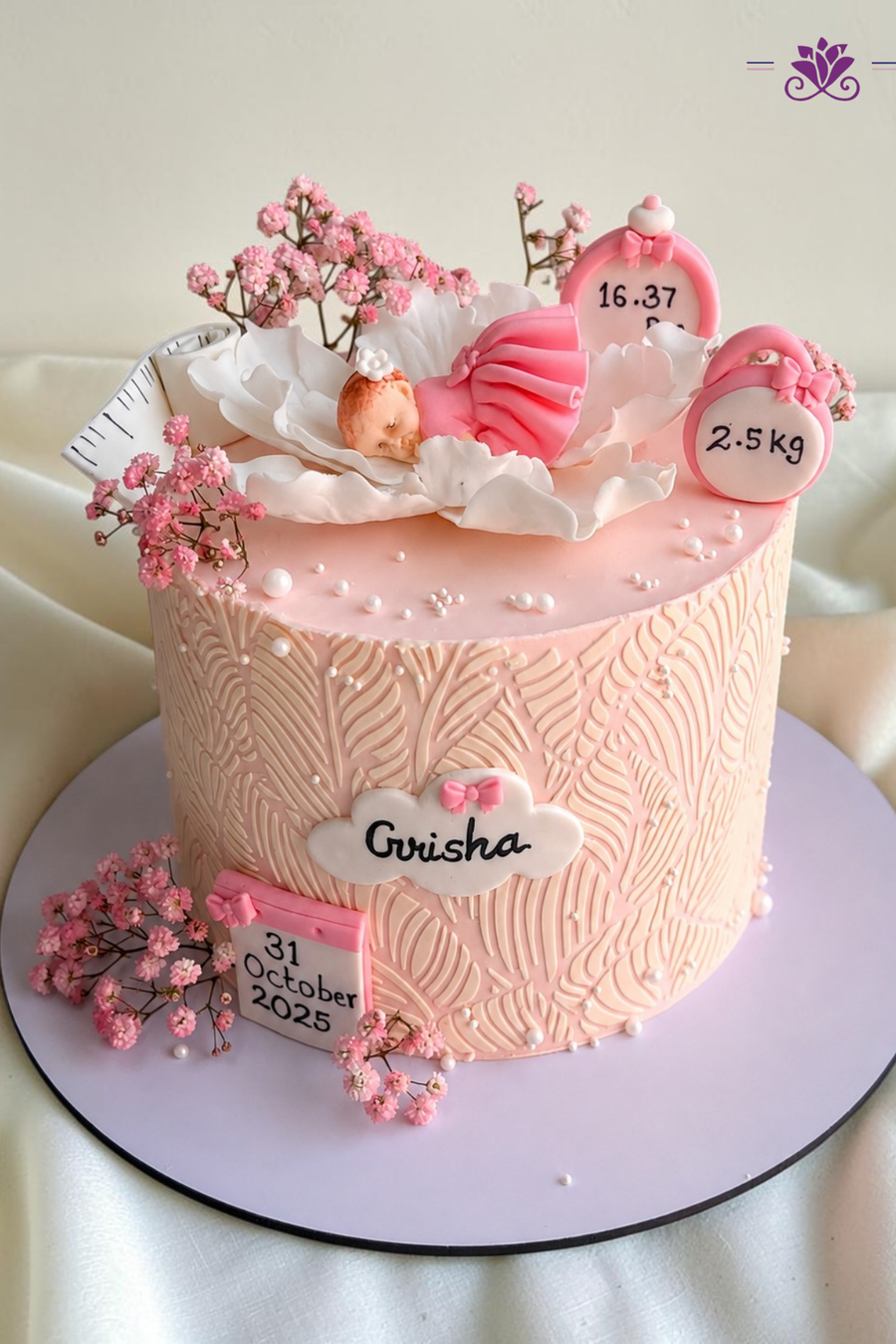 Delicate pink baby girl birth announcement cake
