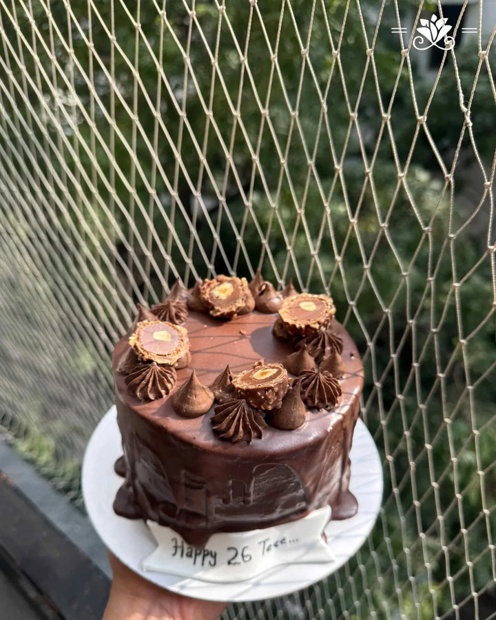 Ferrero Drip Delight Cake