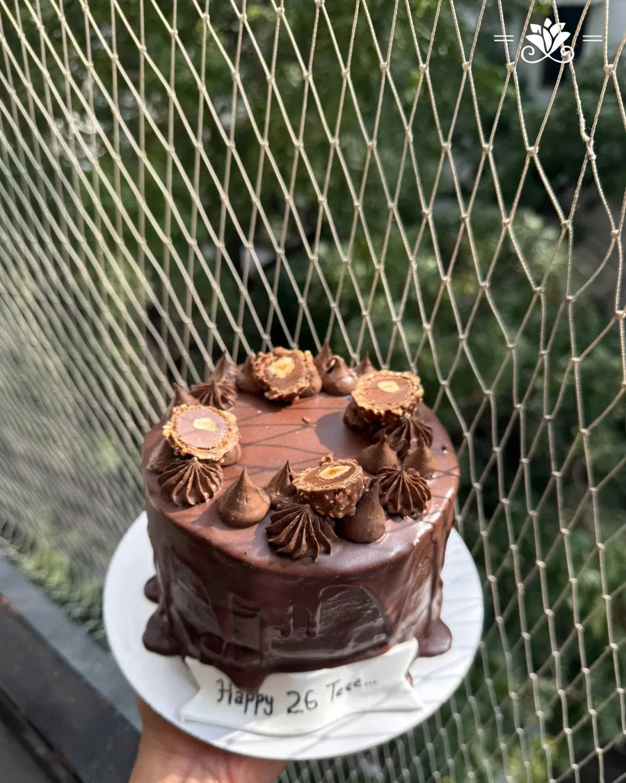 Ferrero Drip Delight Cake - Terrarich Cake Studio