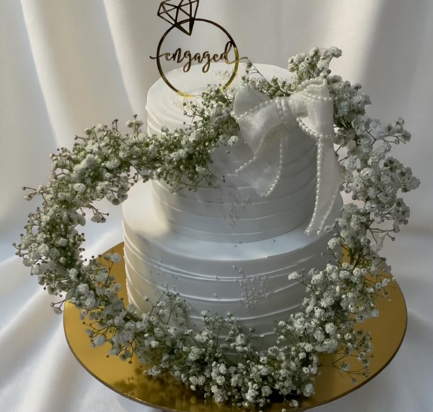 Elegant Engagement Cake with Baby’s Breath Flowers, Pearl Bow & Ring Topper (Eggless Designer Cake)
