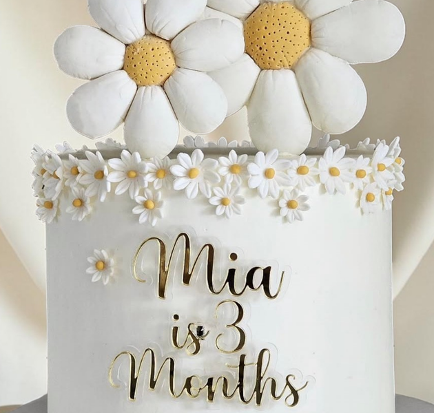 White daisy floral baby milestone cake