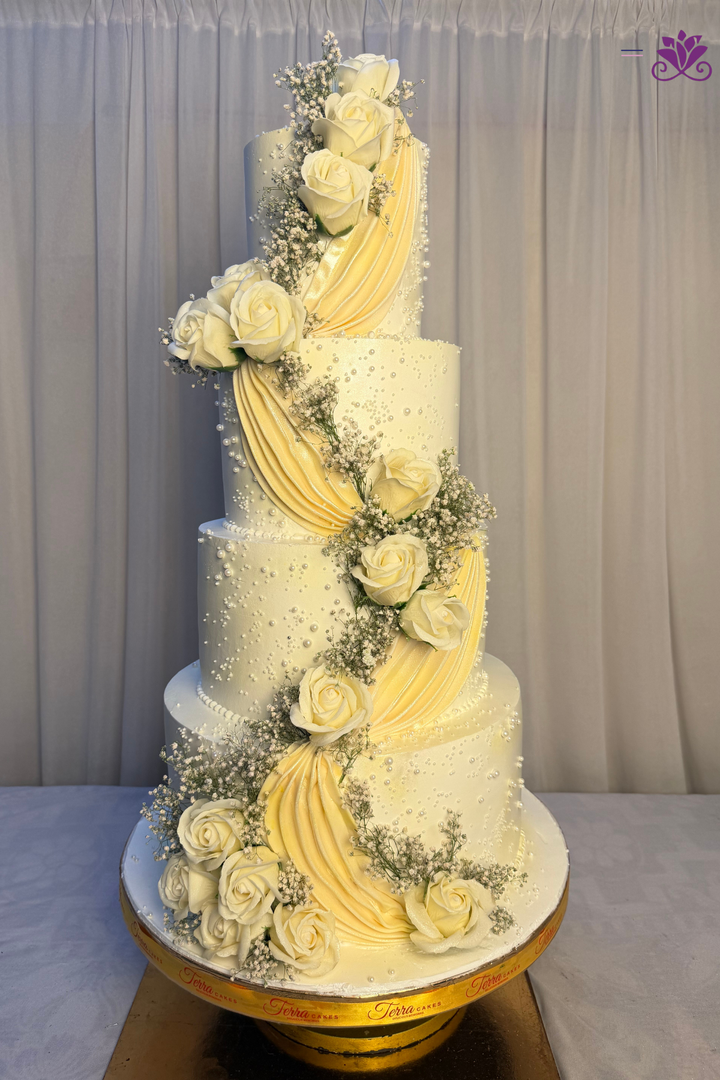 Grand 4-Tier Ivory & Buttercream Swag Cascading Rose Wedding Cake